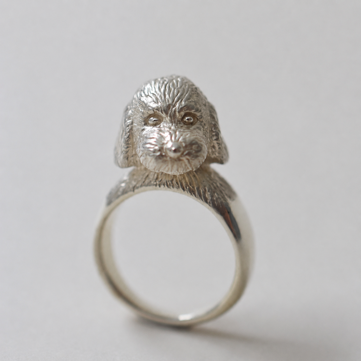 ring poodle face