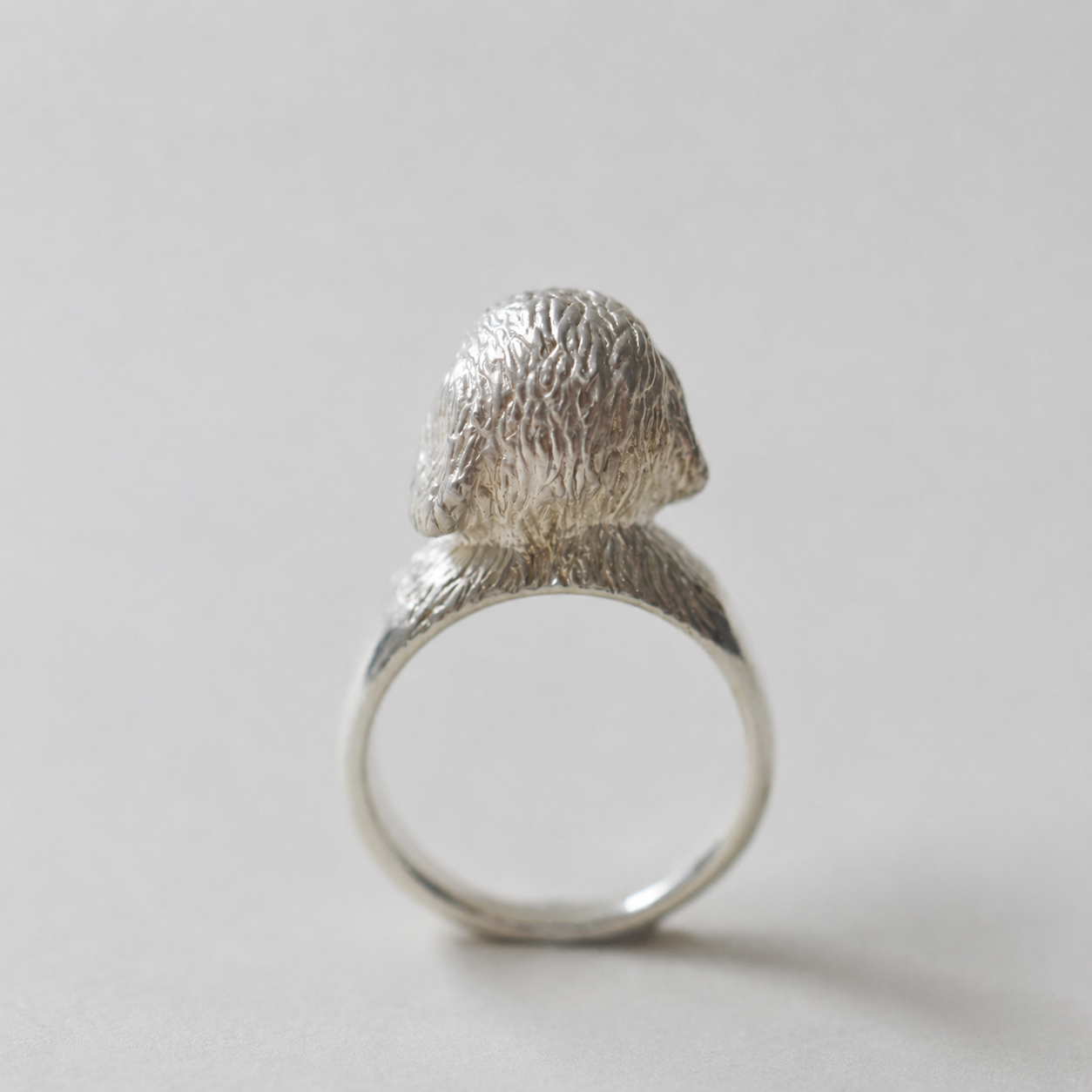 ring poodle face