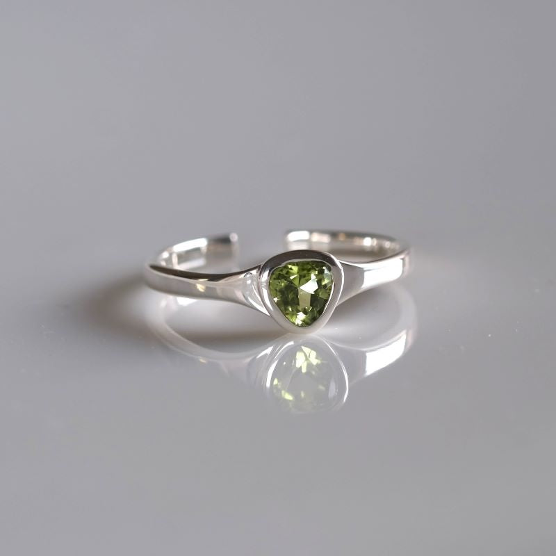 Peridot triangle ring