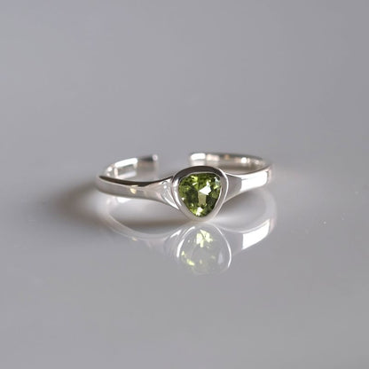 Peridot triangle ring