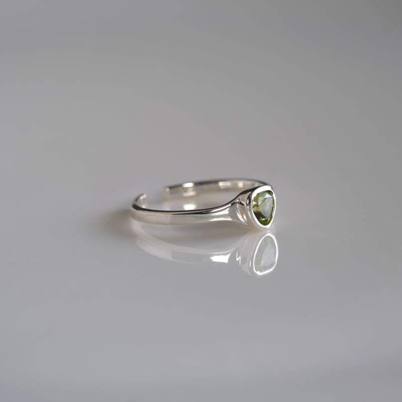 Peridot triangle ring