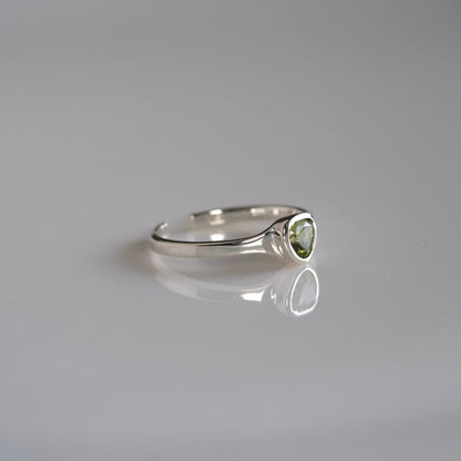 Peridot triangle ring