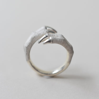 ring tyrannosaurs claw cross
