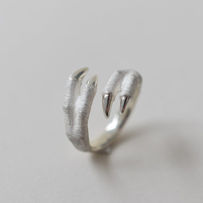 ring tyrannosaurs claw cross
