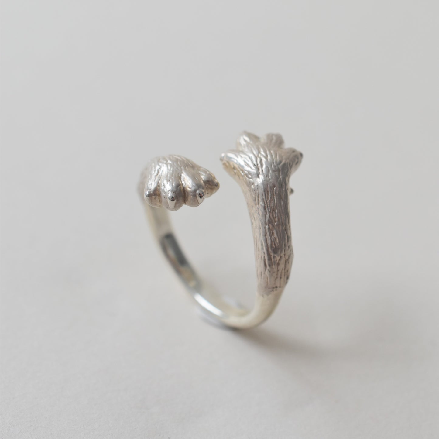 ring talkative cat claw cross