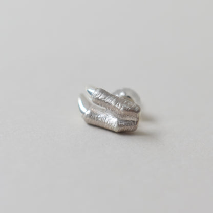 pierced earring tyrannosaurs claw