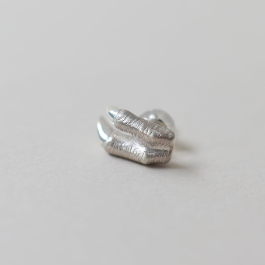 pierced earring tyrannosaurs claw