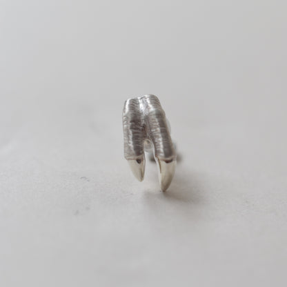 pierced earring tyrannosaurs claw