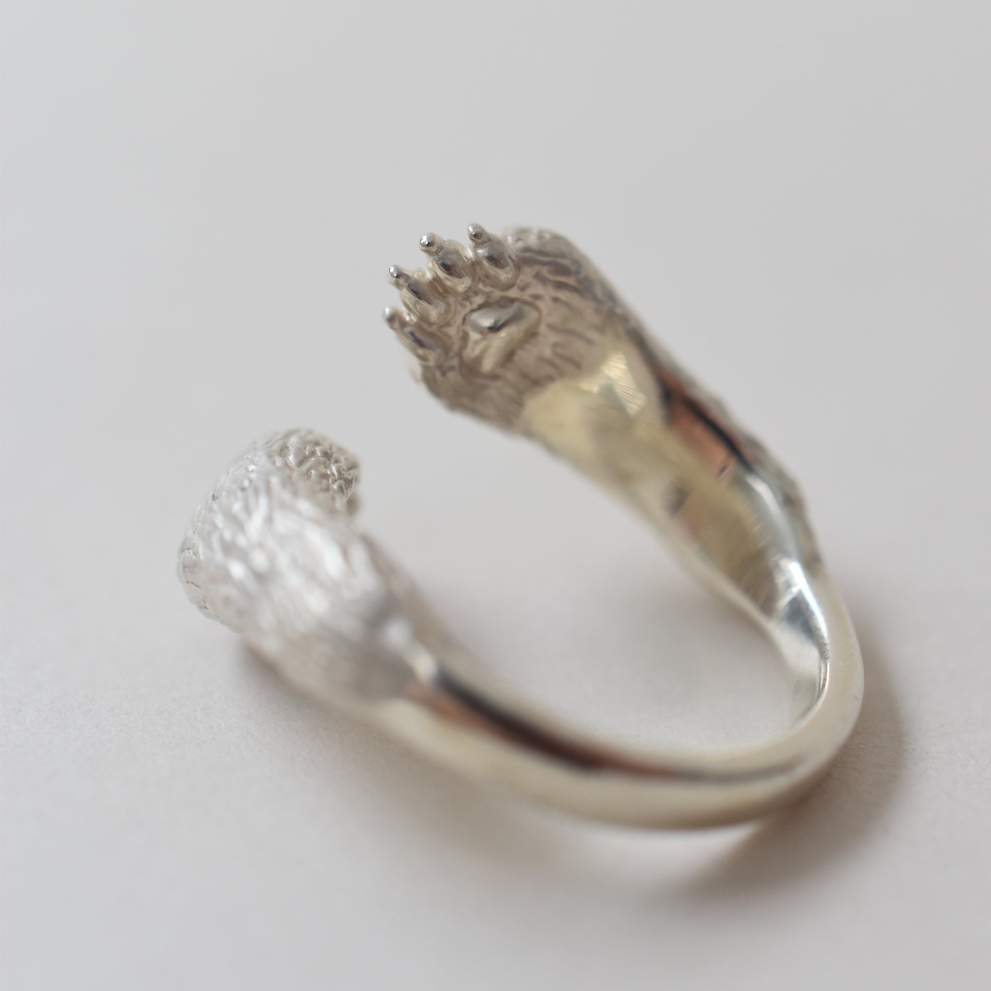 ring puudle claw cross