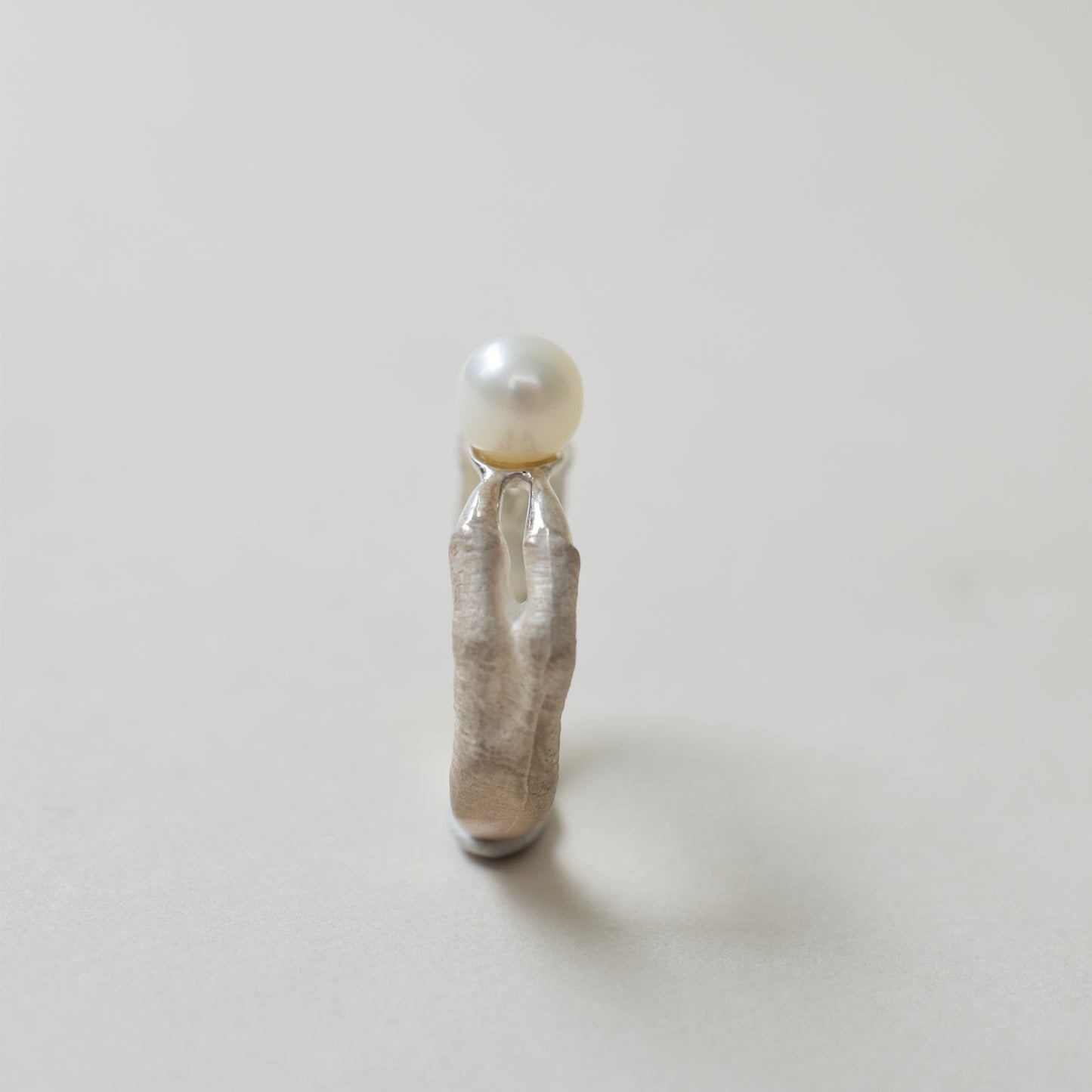 ring tyrannosaurs claw parallel pearl