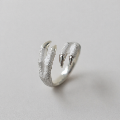 ring tyrannosaurs claw cross